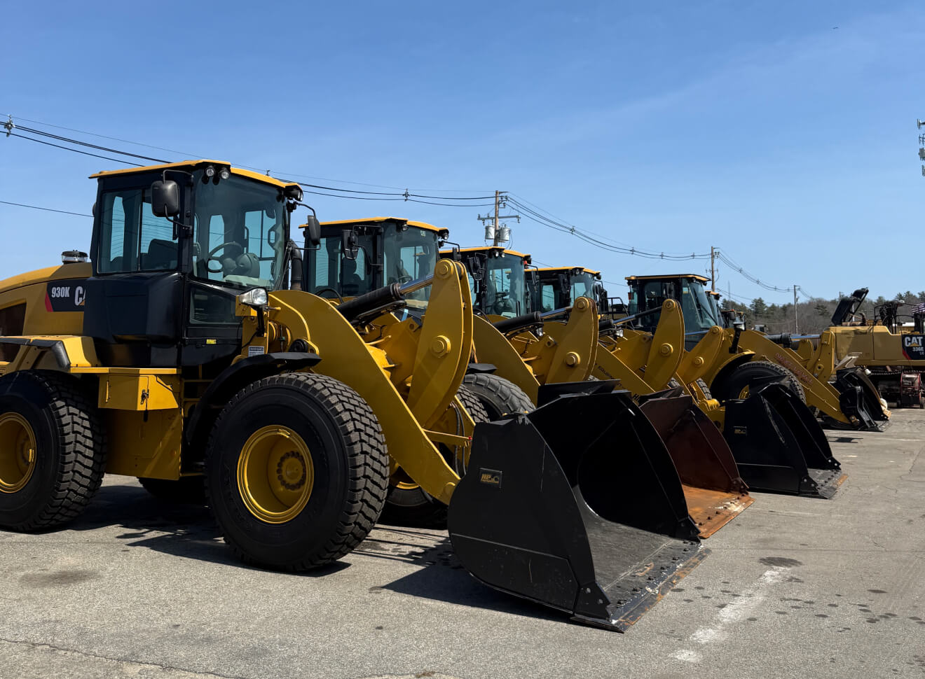 CAT Loaders in a line